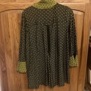Size large women’s dressy blouse. Black with sort of a lime yellow funky print.